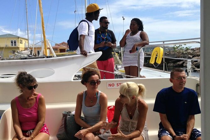 Catamaran Sunset and Cocktail Cruise - Onboard Vibe: Music, Open Bar, and the Crew Touch