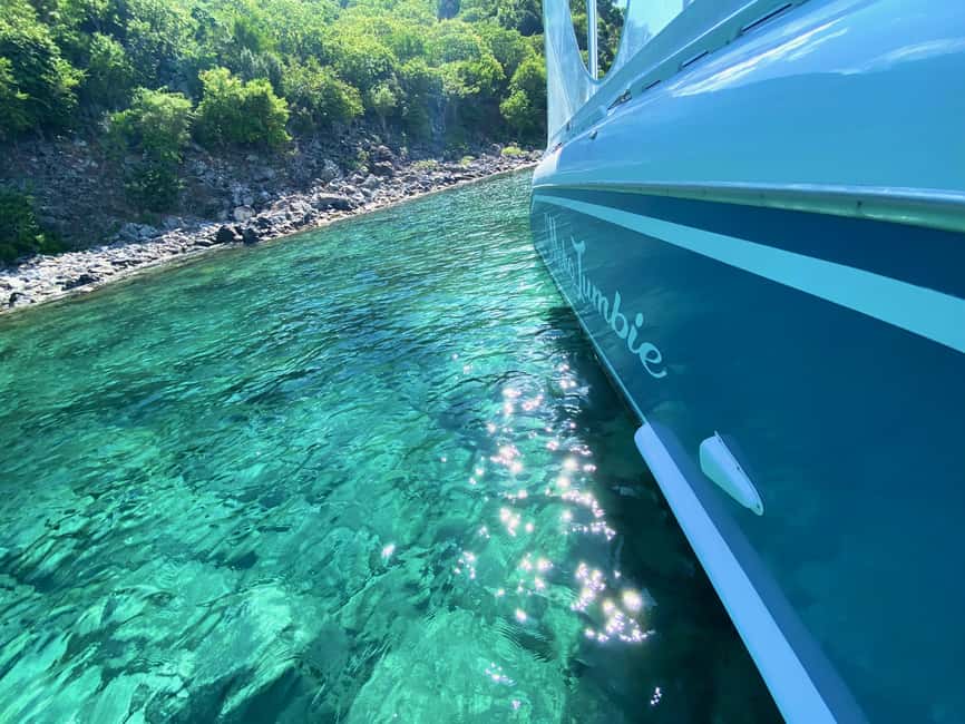 PRIVATE POWER CATAMARAN - Nevis time with Pinny’s Beach bar energy